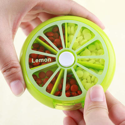 Small weekly medicine dispenser mini kid pill box  7 cases  round tablet case for children or adult